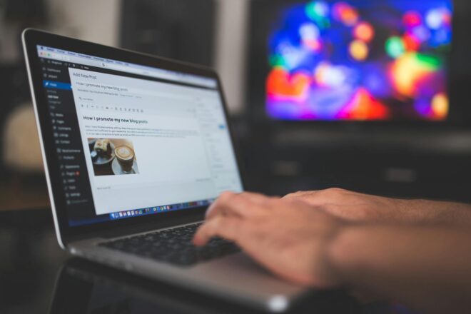 close up of typing on a laptop